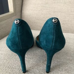 Michael Kors pumps perfect for transitioning for work to evening events.